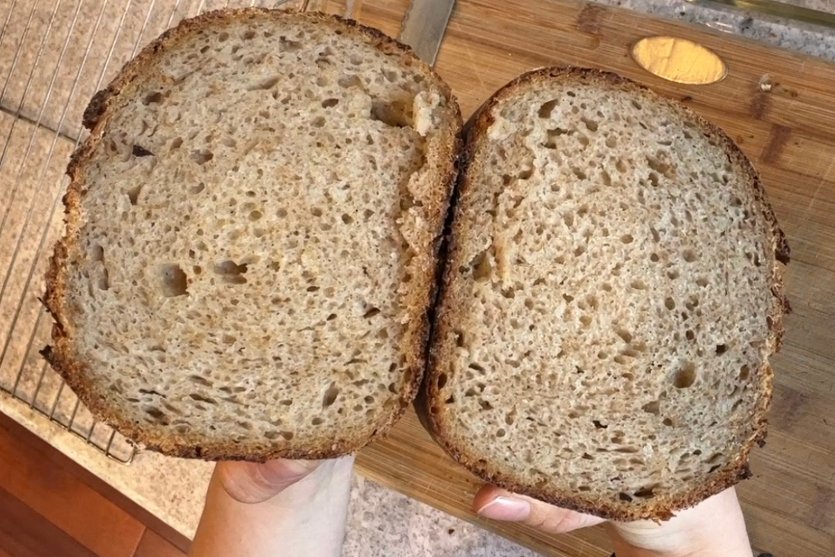 sourdough sandwich bread loaf made from scratch cut in half